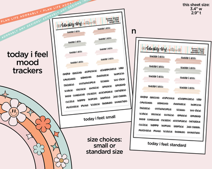 Two mood tracker sheets with different sizes on a colorful background